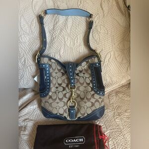 NWT Coach Women's signature perforated Duffle Bag Very Rare